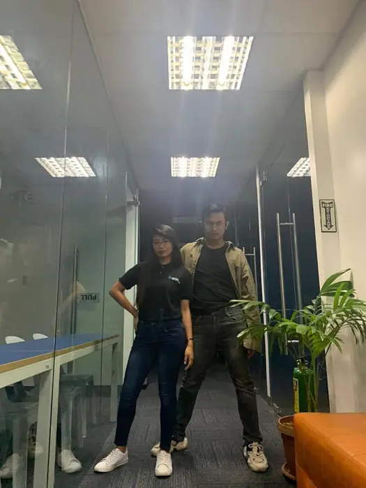 Joy with a colleague at the publishing office