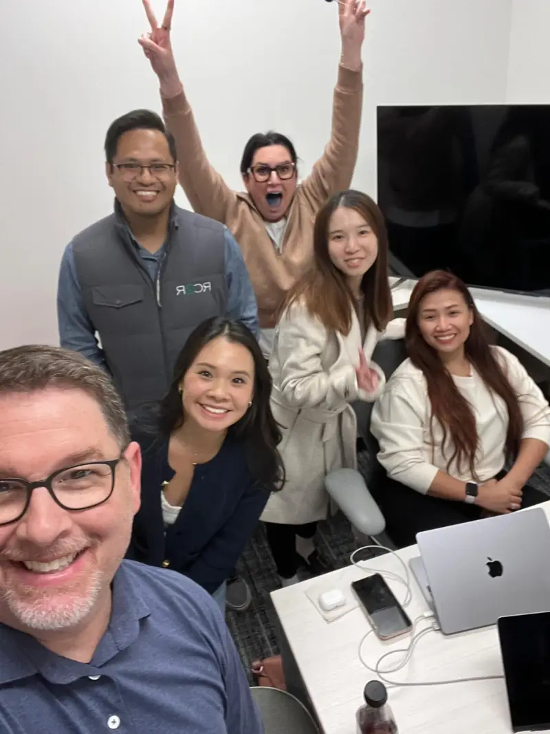 RCVR team celebrating in the office