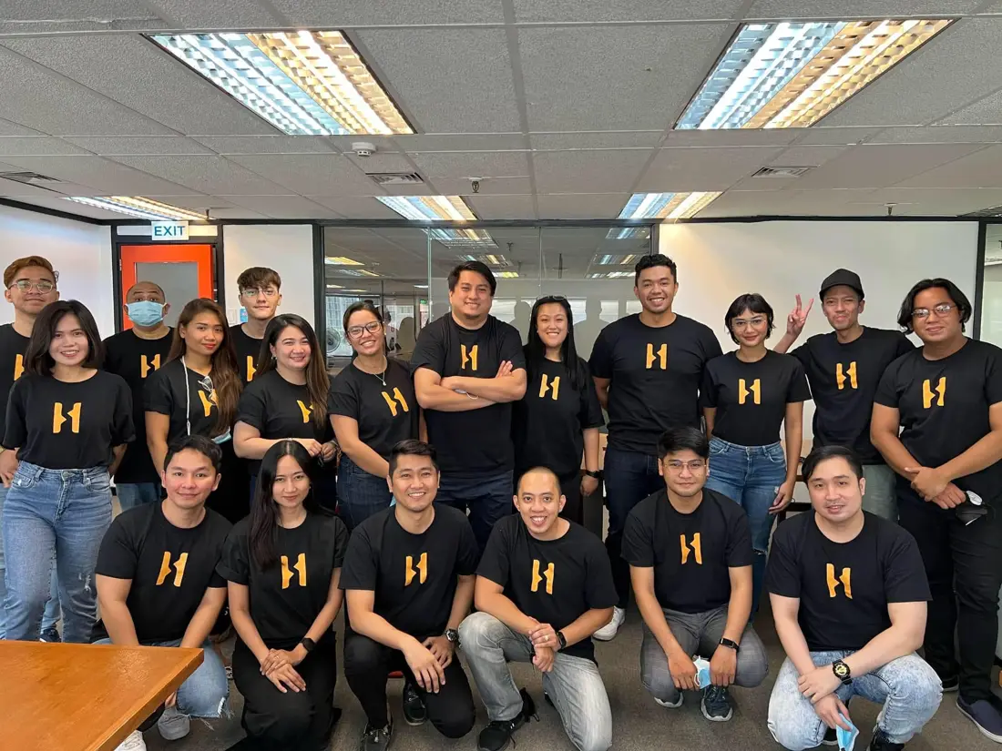 Joy with the StoreHub Philippines team in matching StoreHub shirts